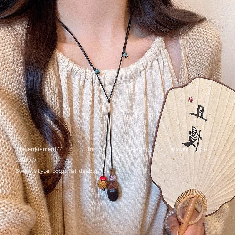Wholesale New Chinese Zen retro feather necklace double layer long sweater chain Bohemian