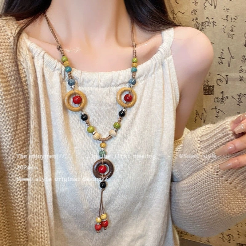 Wholesale New Chinese Zen retro feather necklace double layer long sweater chain Bohemian