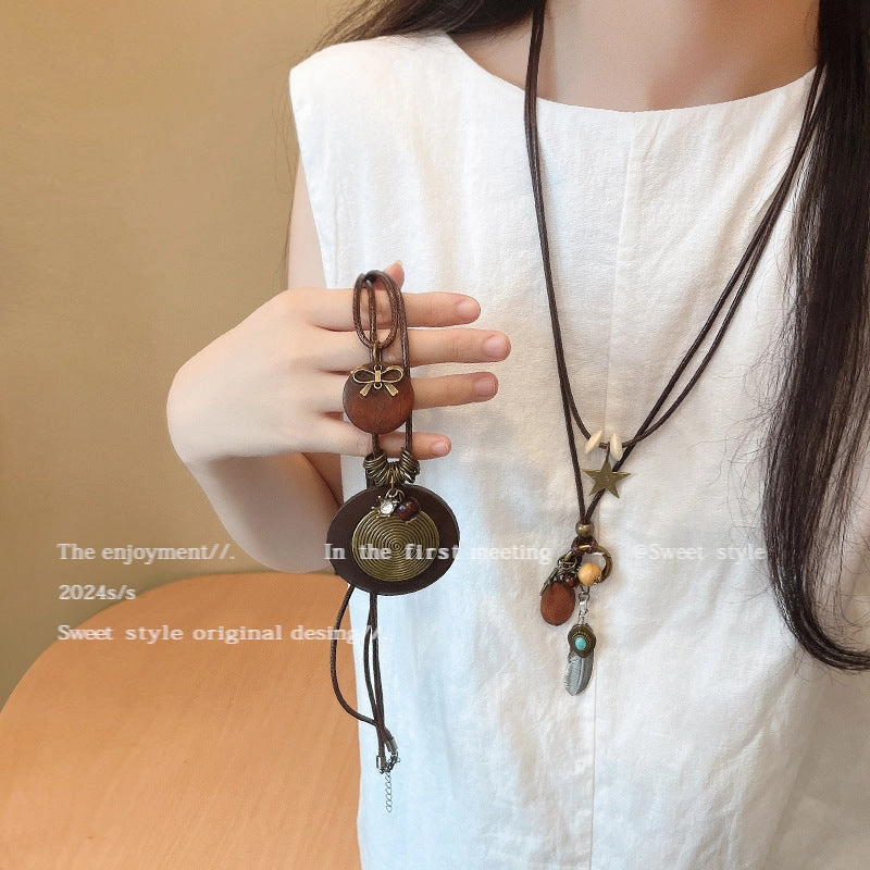 Wholesale New Chinese Zen retro feather necklace double layer long sweater chain Bohemian