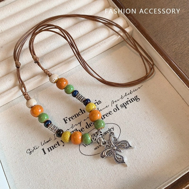 Wholesale New Chinese Zen retro feather necklace double layer long sweater chain Bohemian