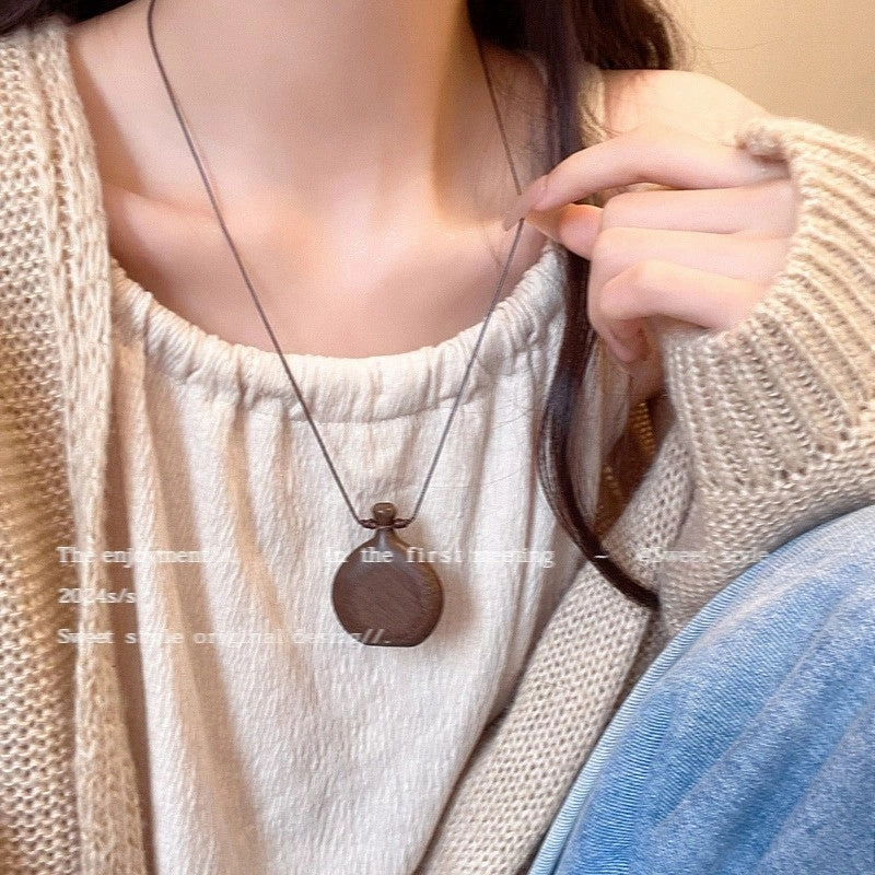 Wholesale New Chinese Zen retro feather necklace double layer long sweater chain Bohemian