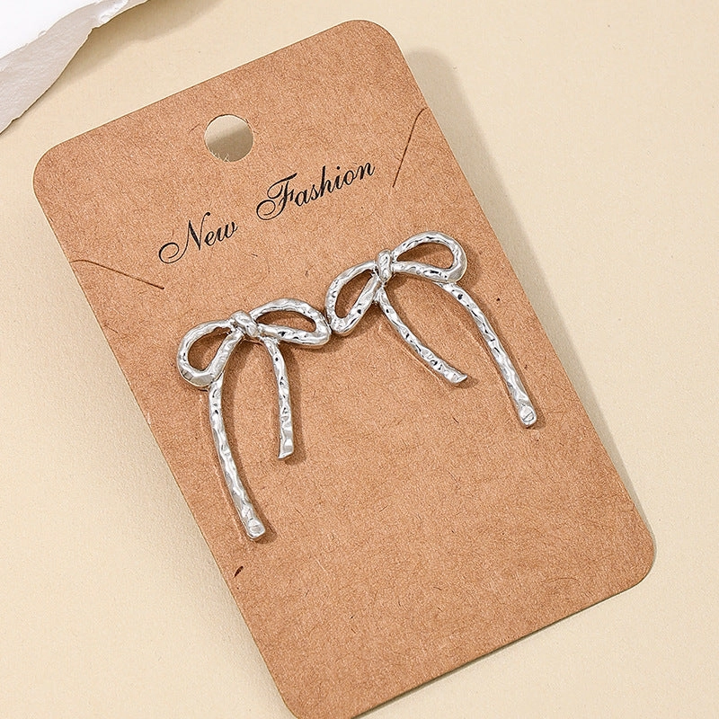 wholesale new INS metal style simple hollow bow earrings