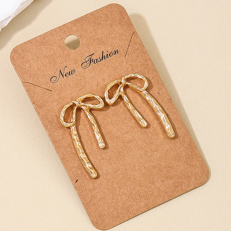 wholesale new INS metal style simple hollow bow earrings