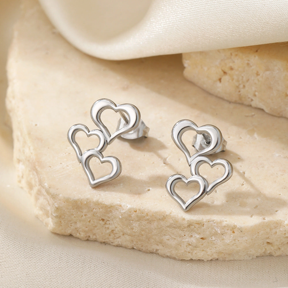 Wholesale New Valentine's Day Simple Fashion Love Stitching Hollow Earrings