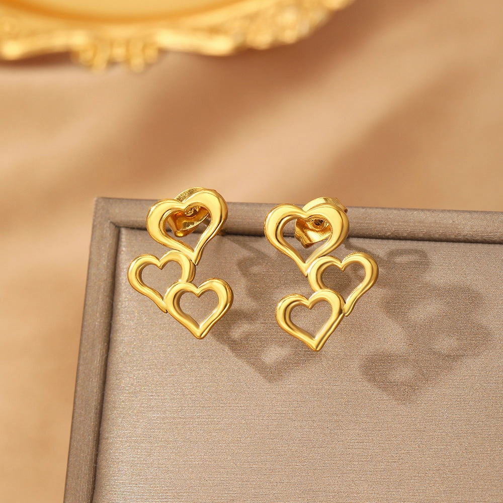 Wholesale New Valentine's Day Simple Fashion Love Stitching Hollow Earrings