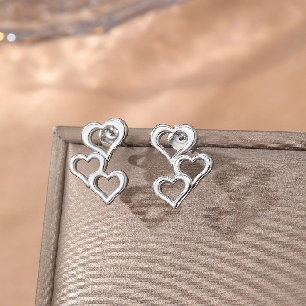 Wholesale New Valentine's Day Simple Fashion Love Stitching Hollow Earrings
