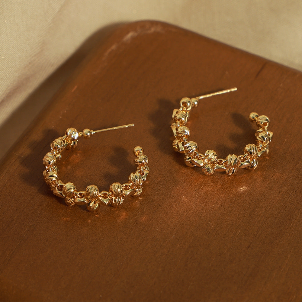 Wholesale niche new personalized jewelry round bead woven stitching design copper material C- type earrings