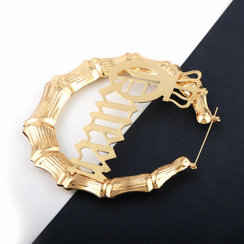 Wholesale Punk English Alphabet Queen Slub Round Metal Earrings