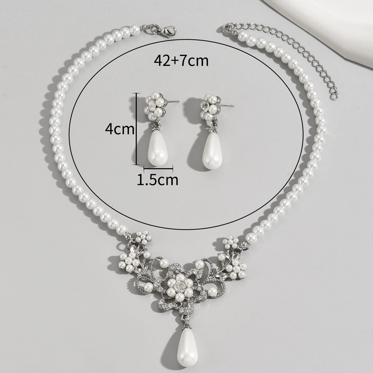 Wholesale Retro Atmospheric Style Pearl Inlaid Zircon Plum Blossom Design Earrings and Necklace Set