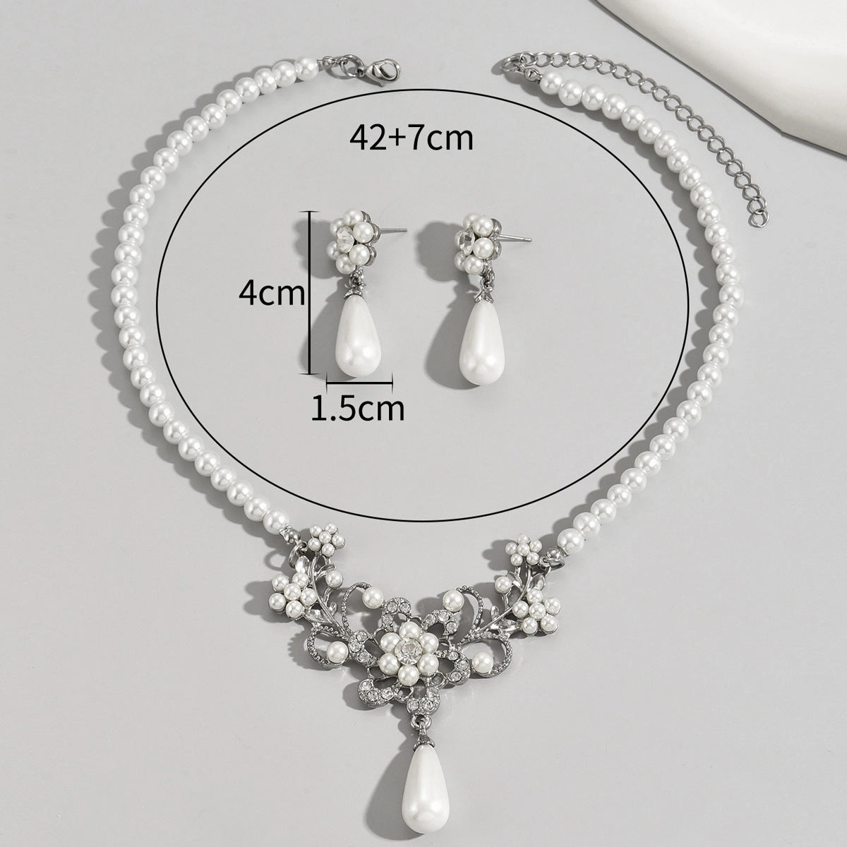 Wholesale Retro Atmospheric Style Pearl Inlaid Zircon Plum Blossom Design Earrings and Necklace Set