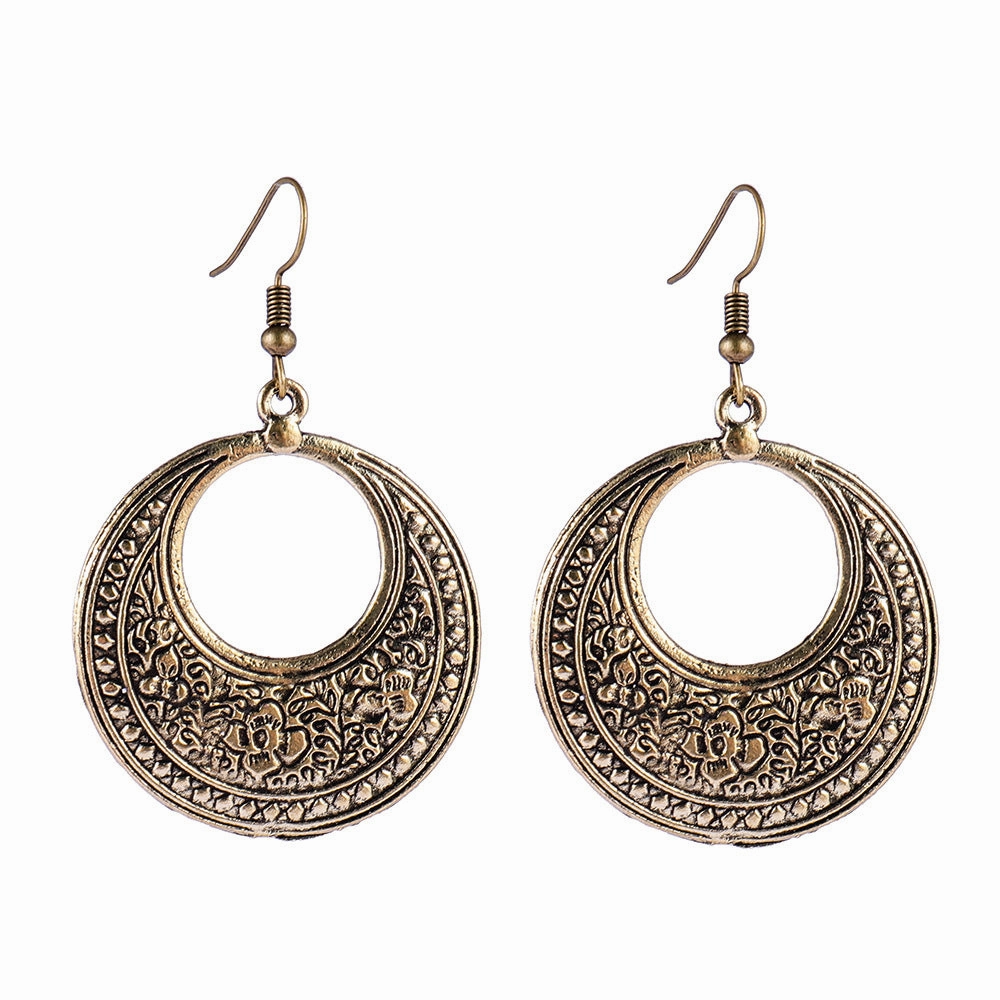 Wholesale Retro ethnic style totem pattern round hollow earrings