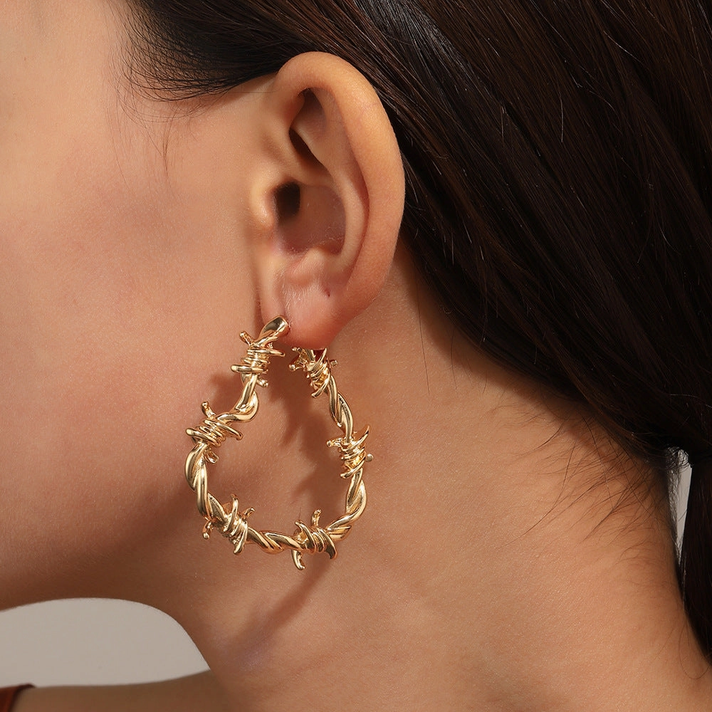 Wholesale Retro Exaggerated Cold Wind Thorn Love Earrings