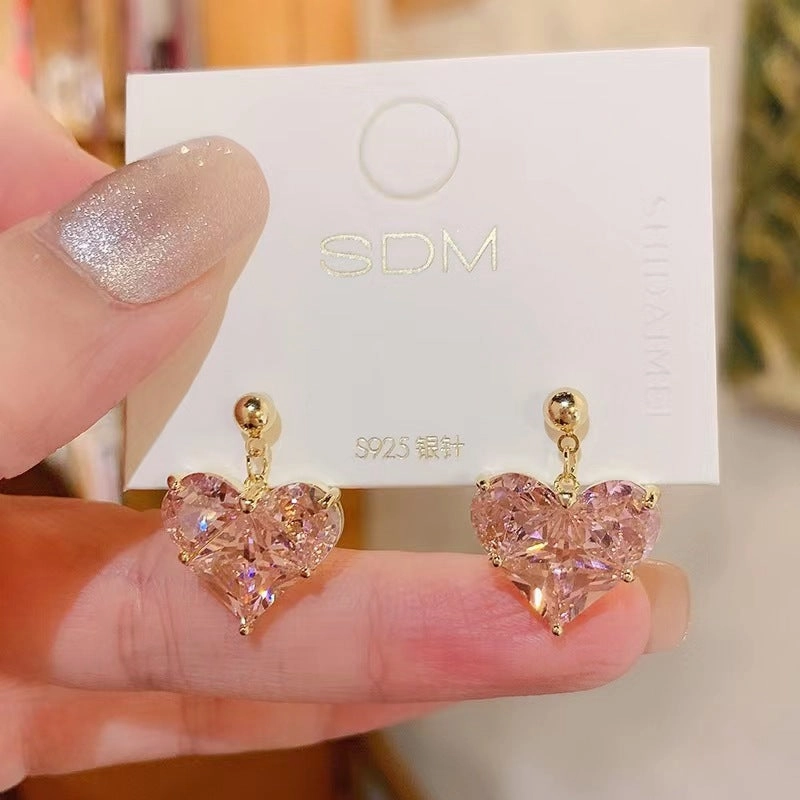 Wholesale Romantic heart-shaped peach pink earrings, fresh and sweet, simple and cool, super shiny earrings