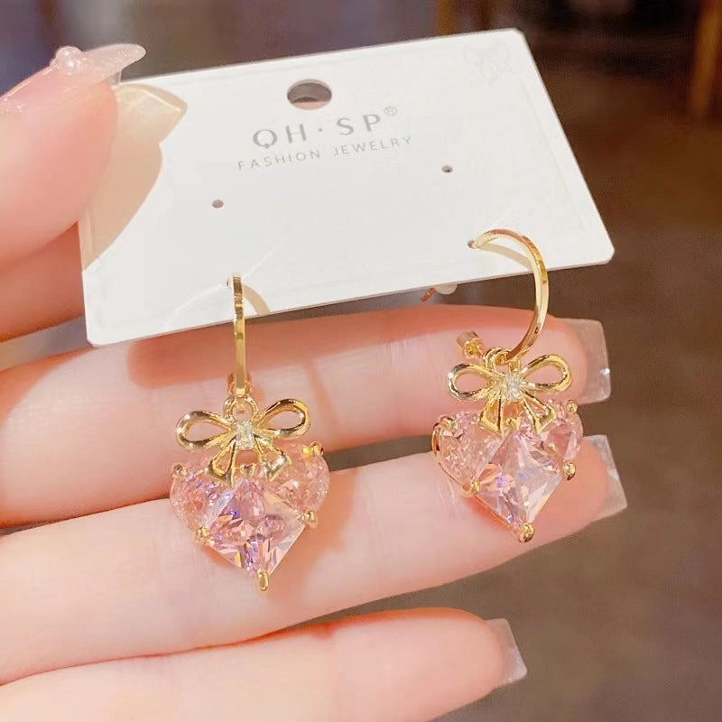 Wholesale Romantic heart-shaped peach pink earrings, fresh and sweet, simple and cool, super shiny earrings