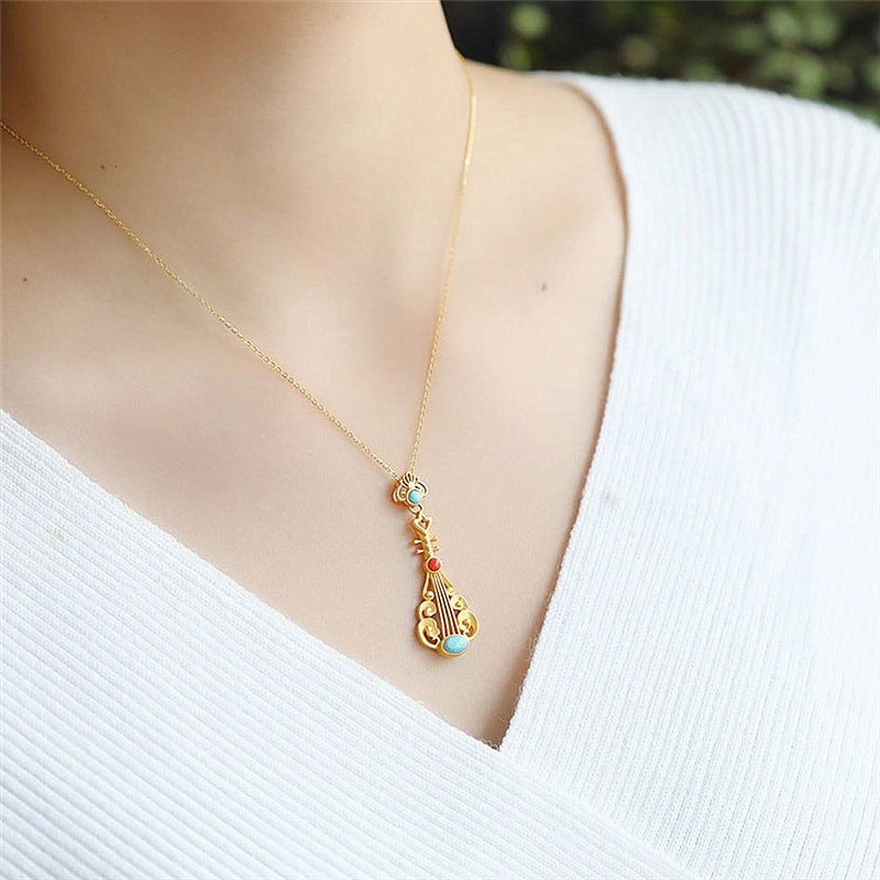 Wholesale Sand gold inlaid turquoise and red Nanhong personality pipa clavicle necklace