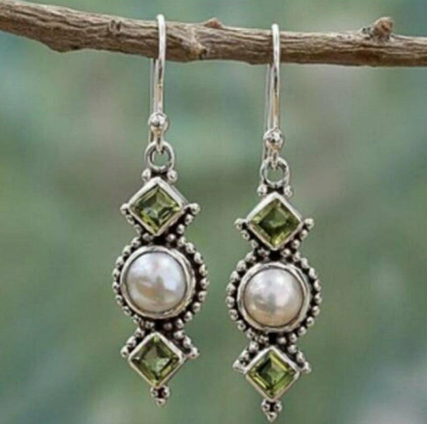 Wholesale Set with Sea Blue Topaz Rotating Water Drop Pear Shaped Earrings