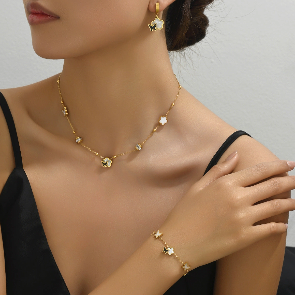 Wholesale Simple Geometric All-match Butterfly Inlaid Zirconia Bracelet Earring Necklace Set