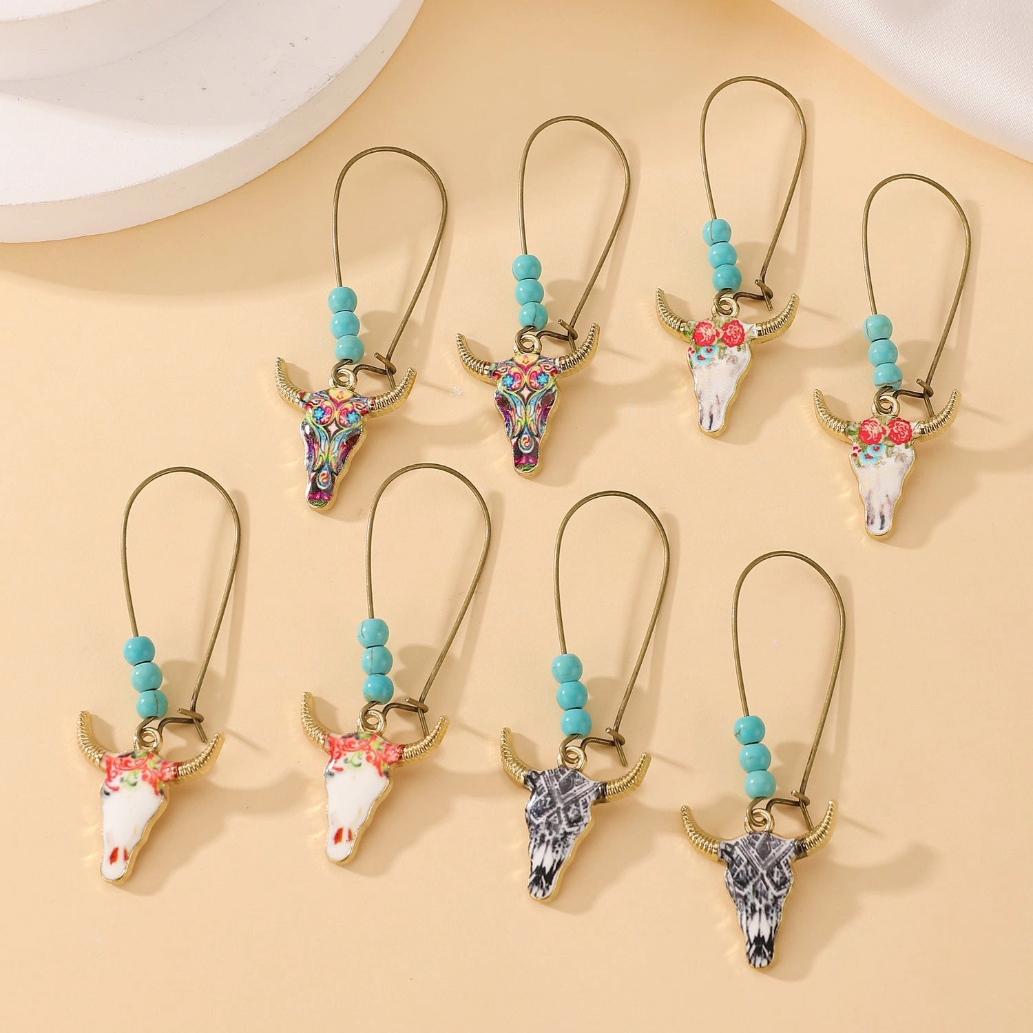 Wholesale Small ethnic style personalized bull head earrings