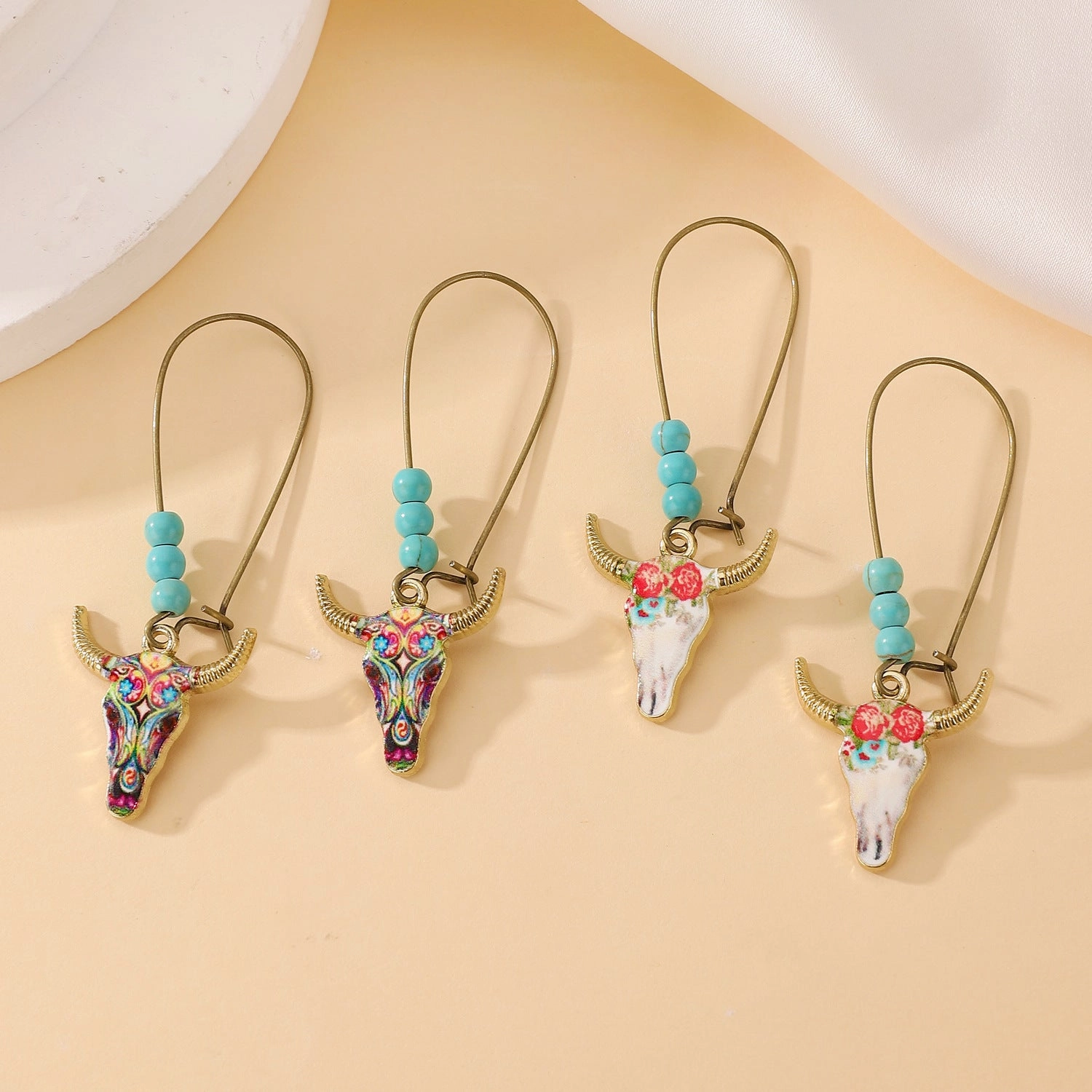 Wholesale Small ethnic style personalized bull head earrings