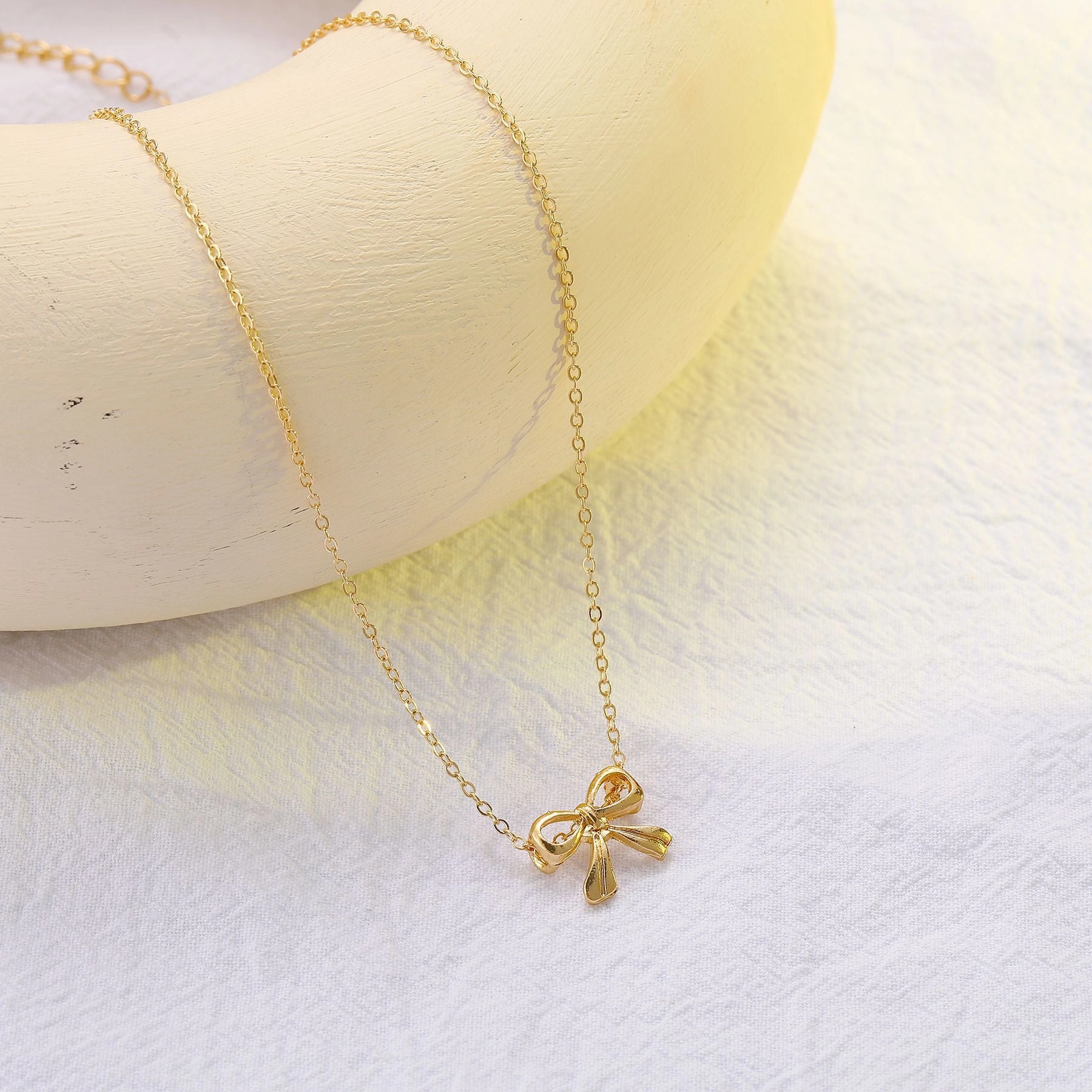 Wholesale Small fresh and cute creative bow necklace