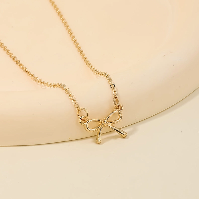 Wholesale sweet metal diamond bow necklace