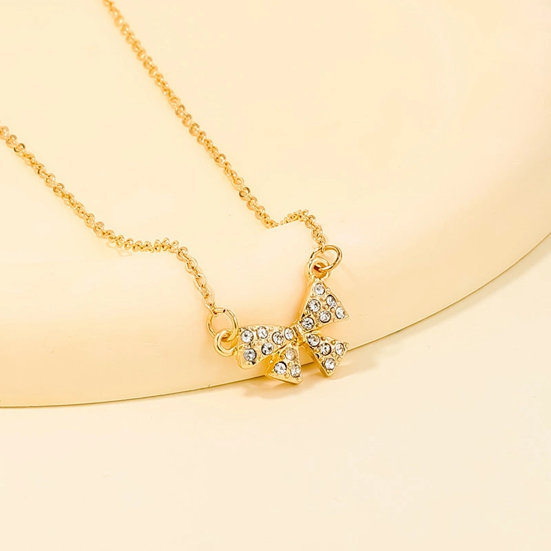 Wholesale sweet metal diamond bow necklace