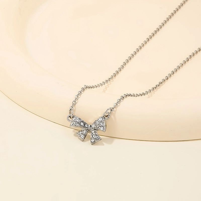 Wholesale sweet metal diamond bow necklace