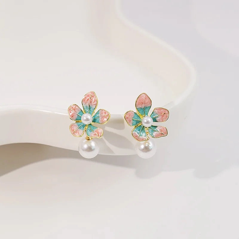 Wholesale Sweet oil-drop flower pearl earrings enamel powder blue petal earrings