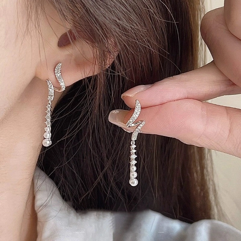 Wholesale Temperament long round face slim galaxy tassel earrings
