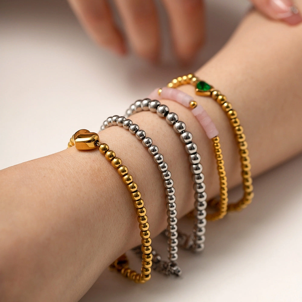 Wholesale Titanium Steel 16k Gold Bead Green Heart Zircon Bracelet