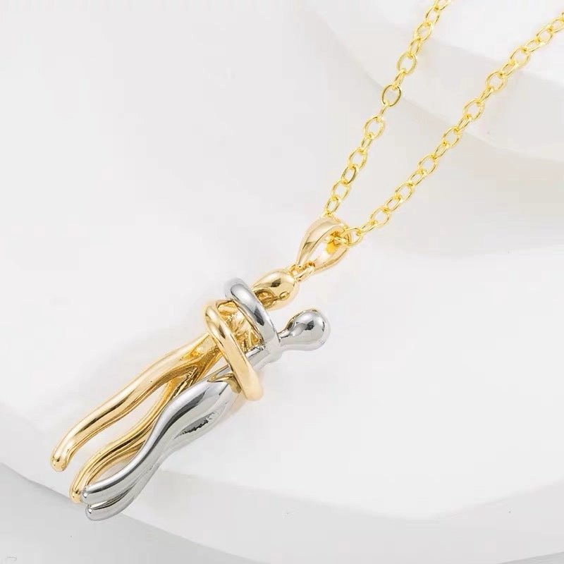 Wholesale titanium steel two-color hug necklace creative little man hands embrace 18k gold lovers clavicle chain Valentine's Day gift