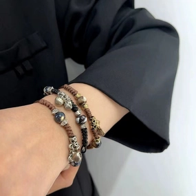 Wholesale Vintage Ceramic Bells Safety Lock Handwoven Rope Bracelets