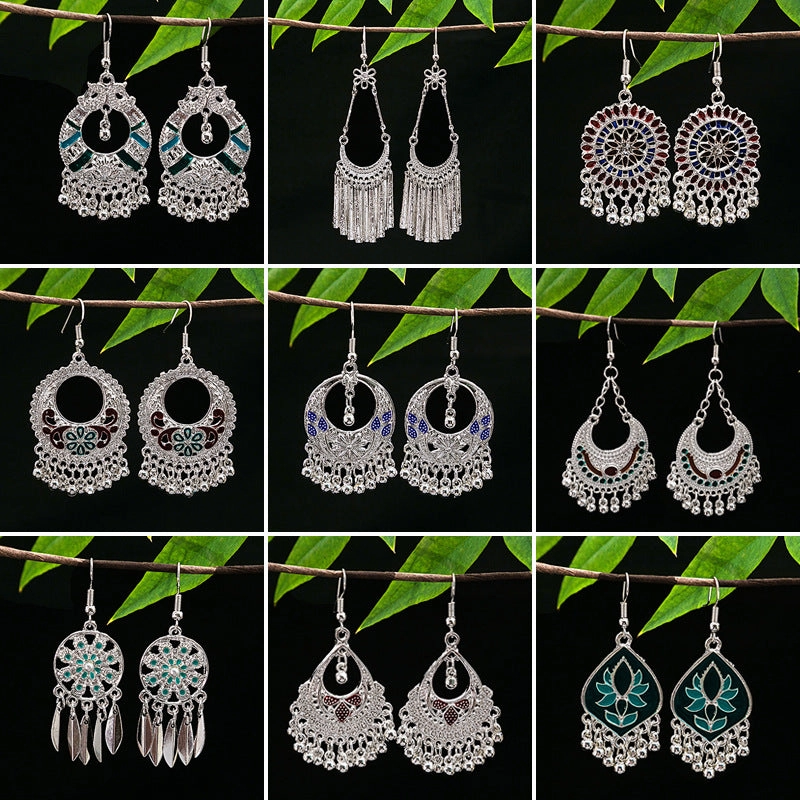 Wholesale Vintage Ethnic Style Bell Tassel Hollowed Out Alloy Earrings