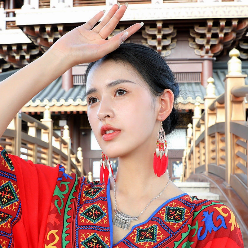 Wholesale Water drop tassel feather earrings long Bohemian rice beads ethnic style earrings