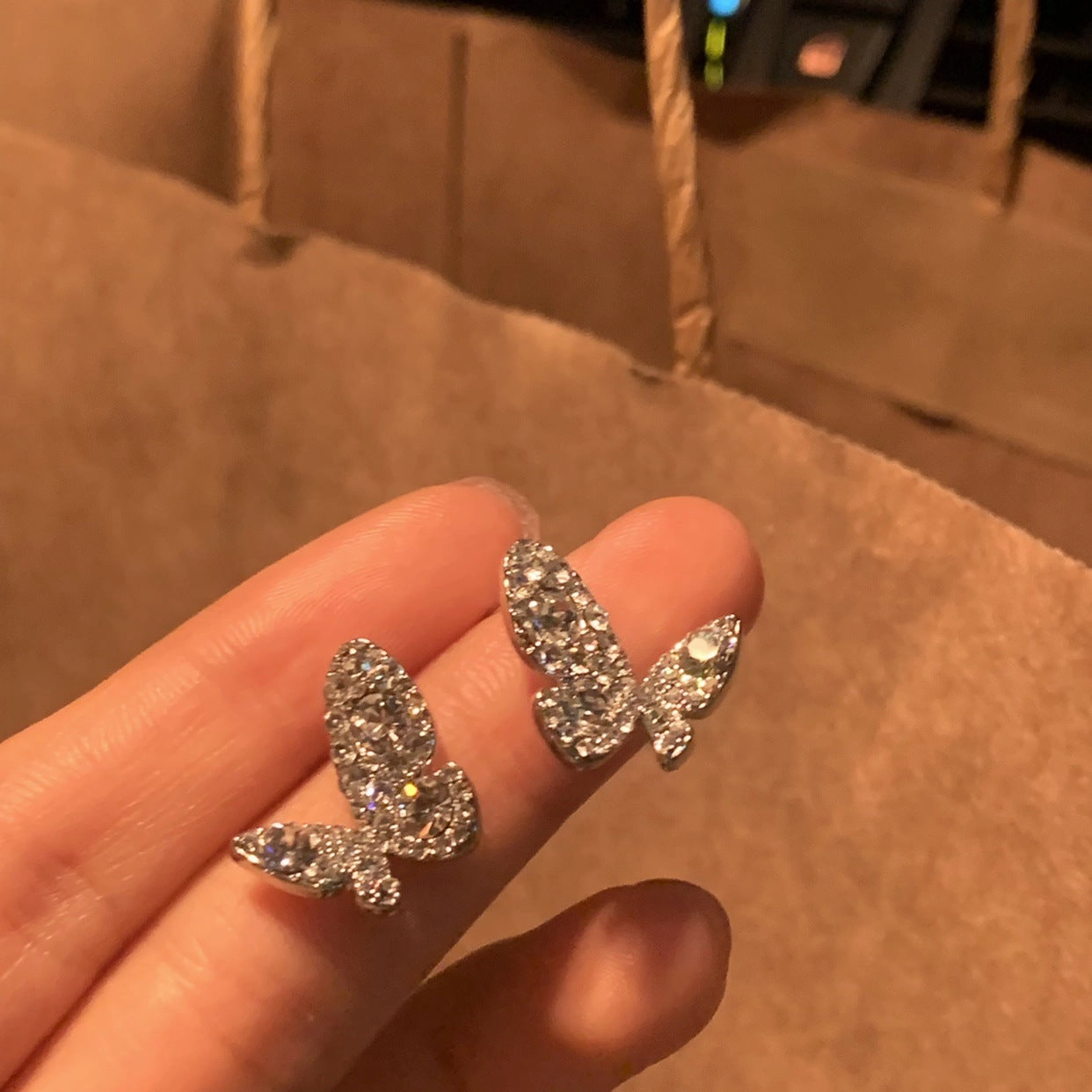 Wholesale Women's shiny butterfly clip earrings with full diamonds