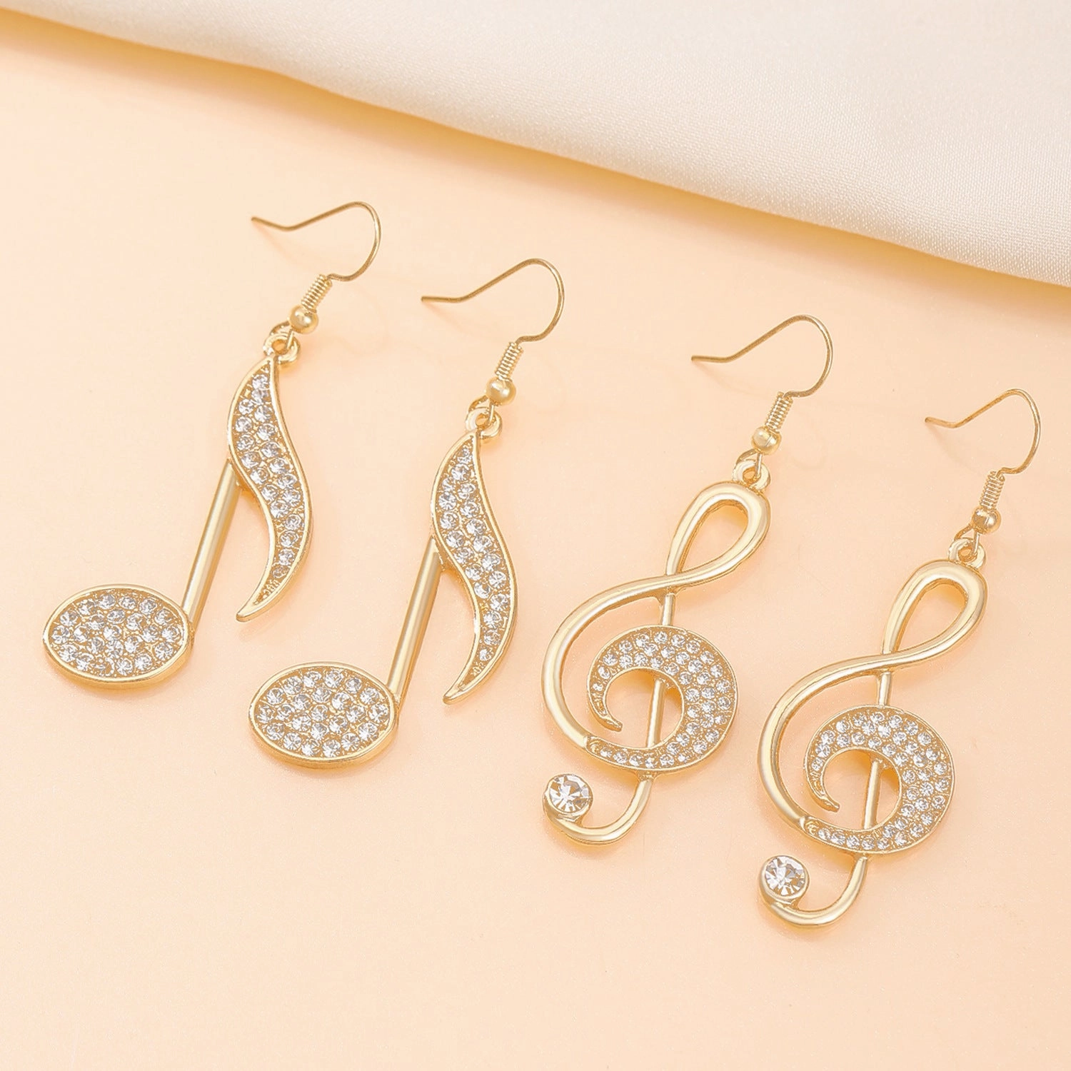 Wholesale Zirconia Musical Note Stud Earrings Asymmetrical